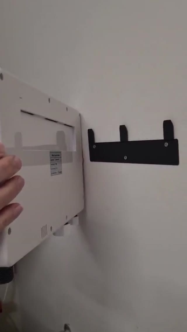 The mounting bracket and the back of the white system